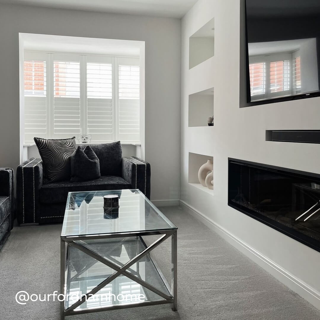White Full Height Shutters in a classy monochrome modern home with glass coffee table