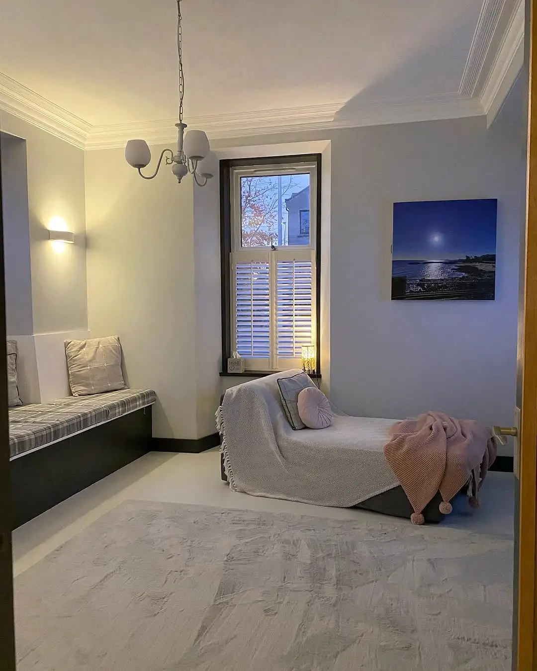 White Cafe Style shutters in a cosy living room